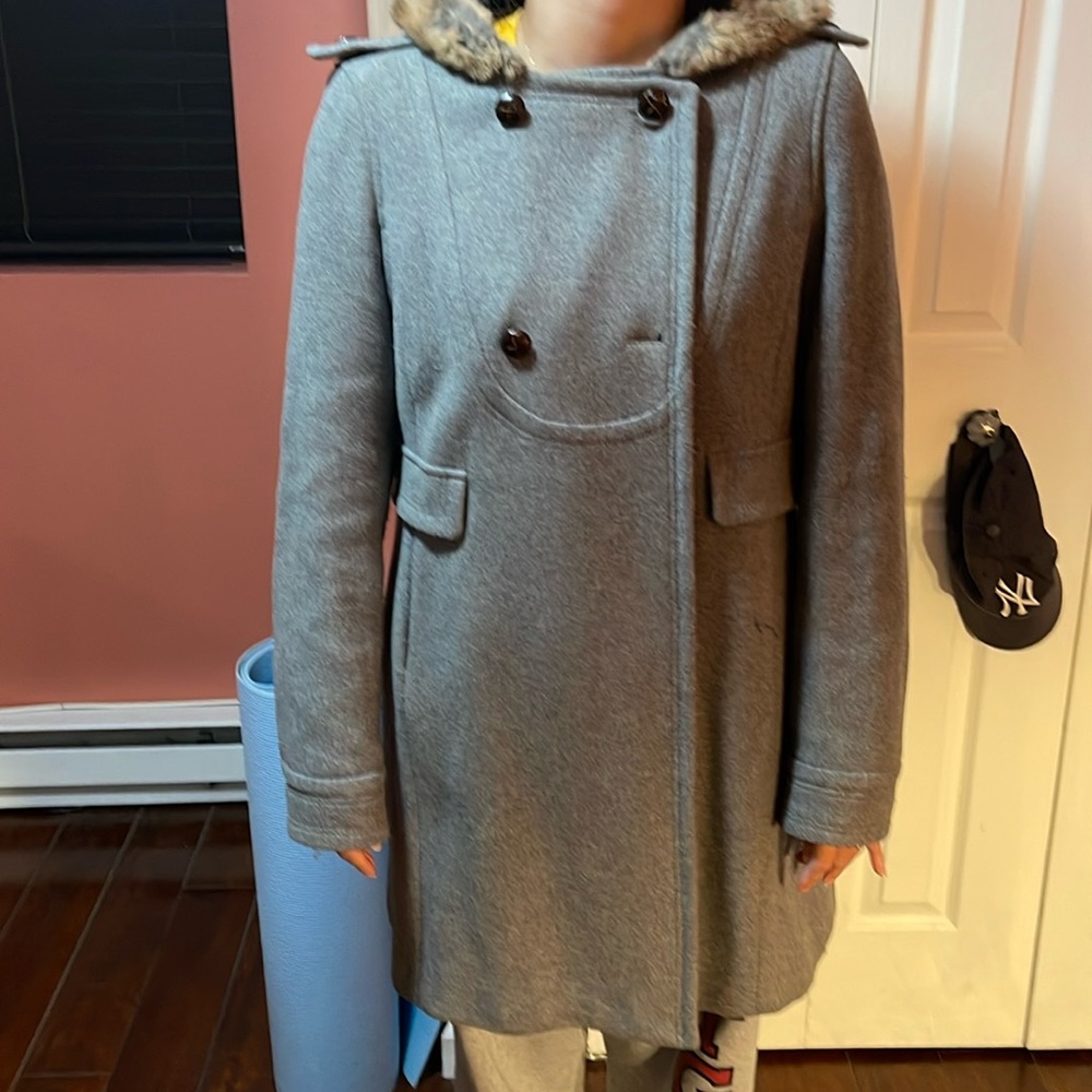 Gray knee length winter coat with hooded fur